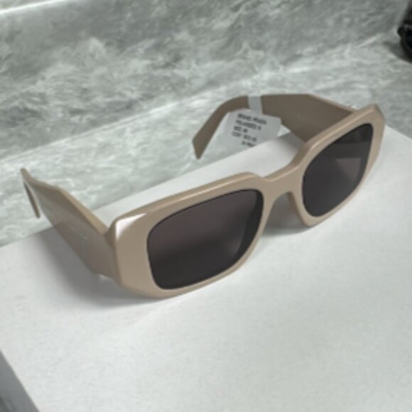 NEW | PRADA | 17WS | 17WS VYJ6X1 | 49 | POWDER | PURPLE BROWN | NON POLARIZED - Picture 1 of 5